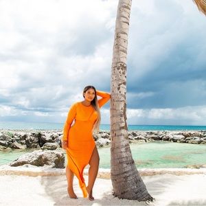 NakedWardobe long elegant stretchy dress. Sz M, long sleeves, orange, high slit.